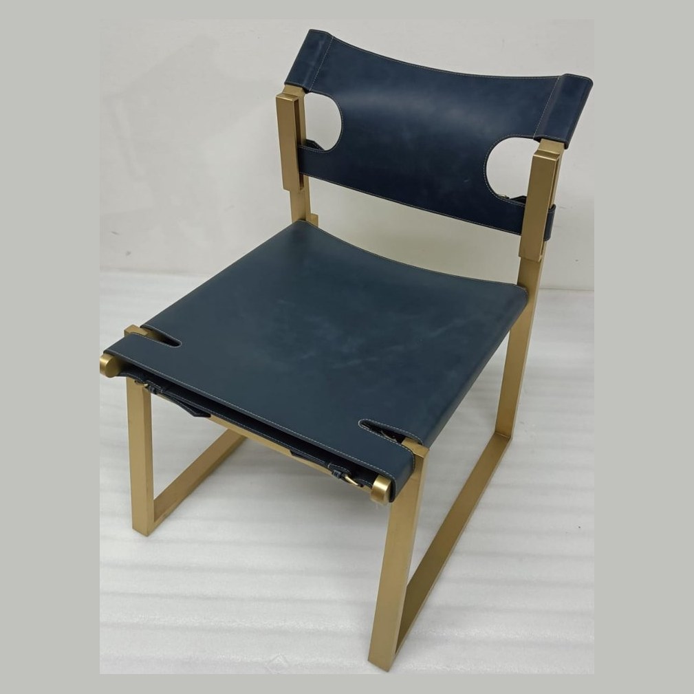 Blue leather sling chair with brass frame
