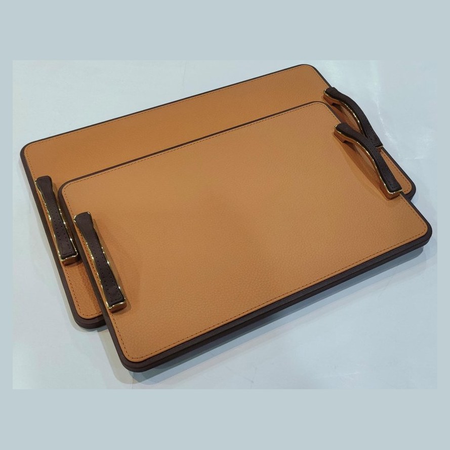 Pair of tan leather trays