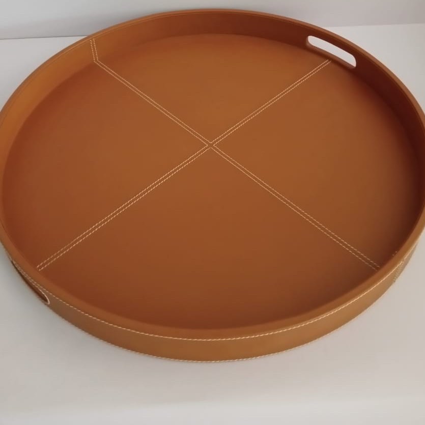 Round tan leather tray
