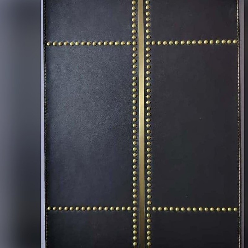 Black leather panel with brass studs (ADL 014)