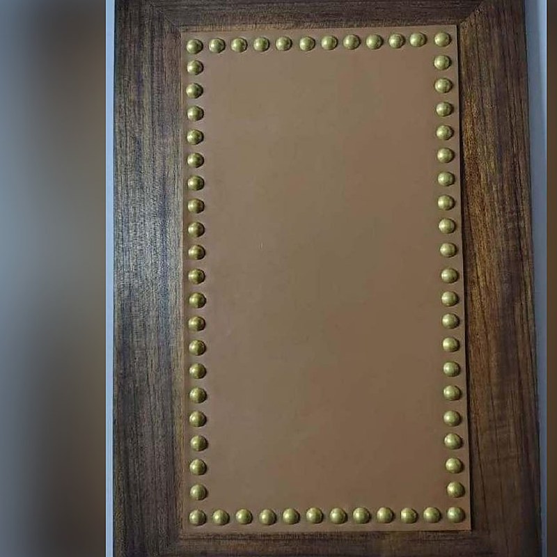 Tan leather panel in studded wood frame (ADL 015)