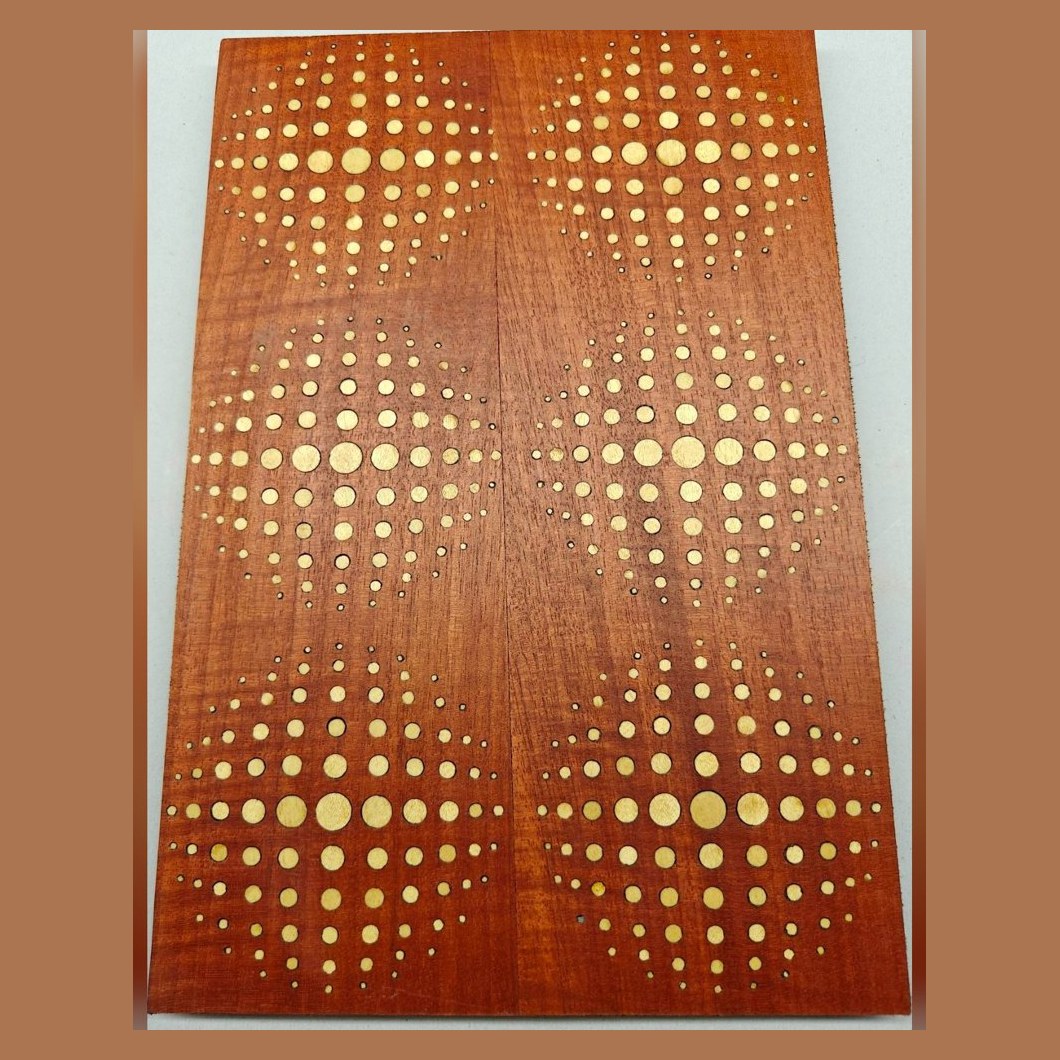 Padauk veneer with brass dot inlay