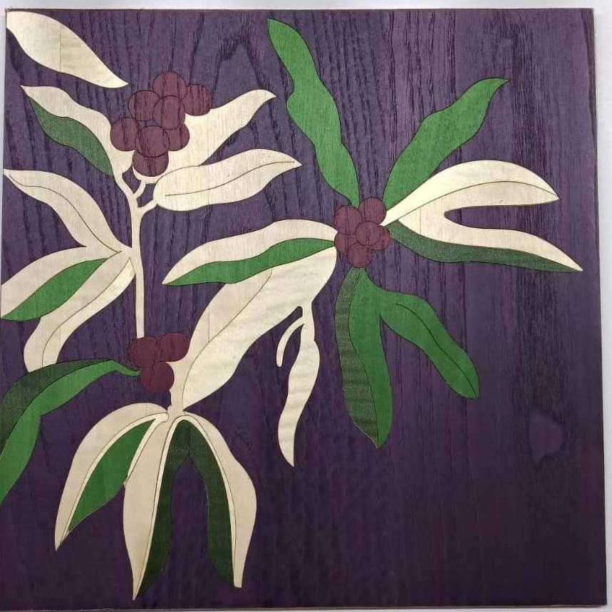 Leaf and berry marquetry on purple veneer