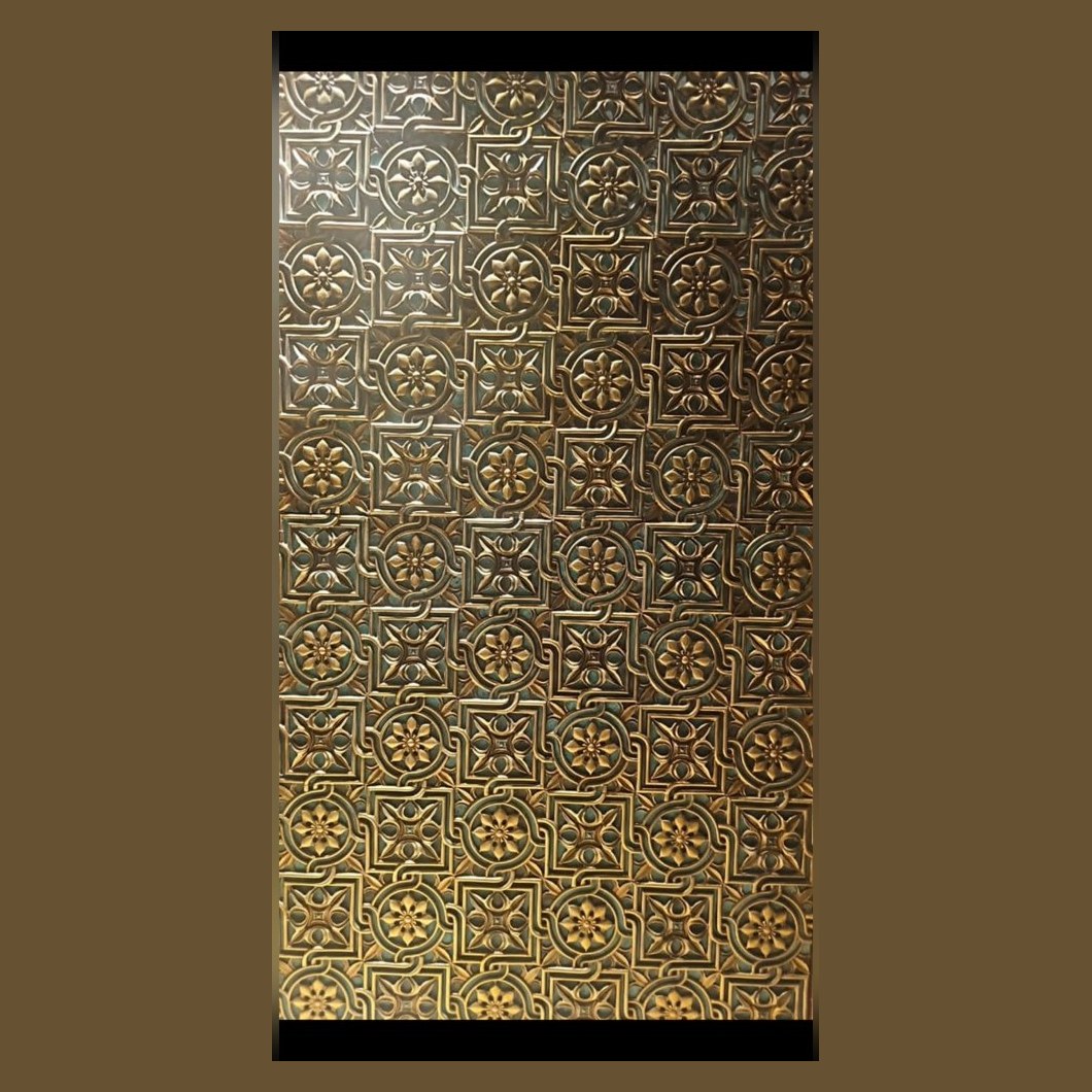 Gold embossed metal tile panel