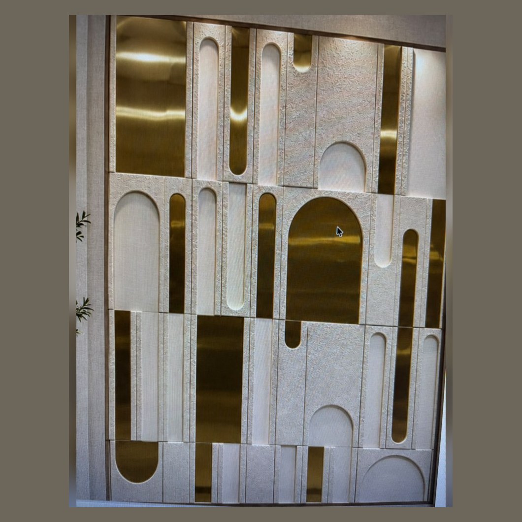 Stone wall panel with brass arch inlay