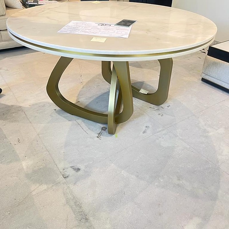 Round dining table with gold base
